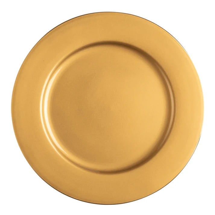 Gold charger plates layered for a place setting